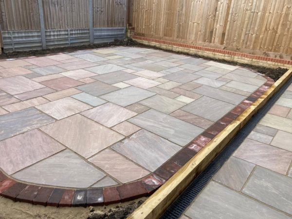 Riven limestone slab installation in Finchley